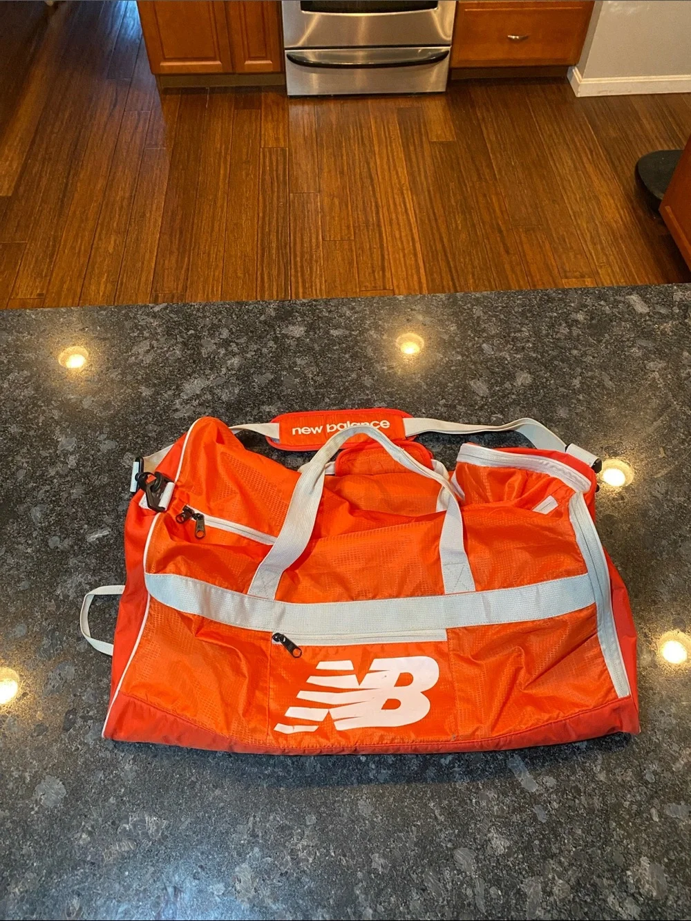 New Balance Orange Duffel Bag with White Accents Large Shoulder Strap